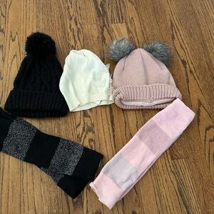 Three beanies and two leg warmers